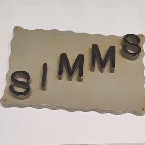 Simm's Beige and Black Wall Plaque by